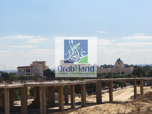 ارض بالغرود الغربية بجمعية احمد عرابى مساحة تطل على الجولف سيتى